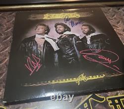 BEE GEES RARE AUTHENTIC FRAMED VINYL RECORD SIGNED BY ALL MEMBERS Certificate