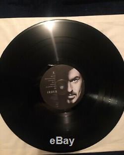 George michael SIGNED! RARE 1996 older vinyl FRAMED comes withMTV UNPLUGGED PASS