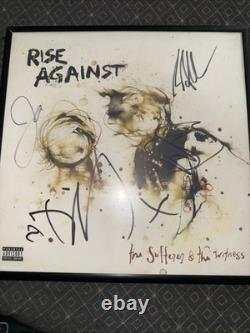 Rise Against the Sufferer and the Witness Vinyl Record Signed By The Band
