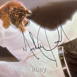 Thriller by Michael Jackson Autographed By MJ. Sold By Juliens Auctions Rare
